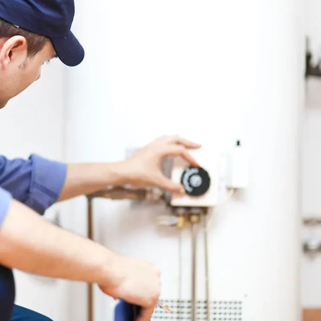 A modern tankless water heater with a green leaf icon, symbolizing its environmentally friendly benefits.